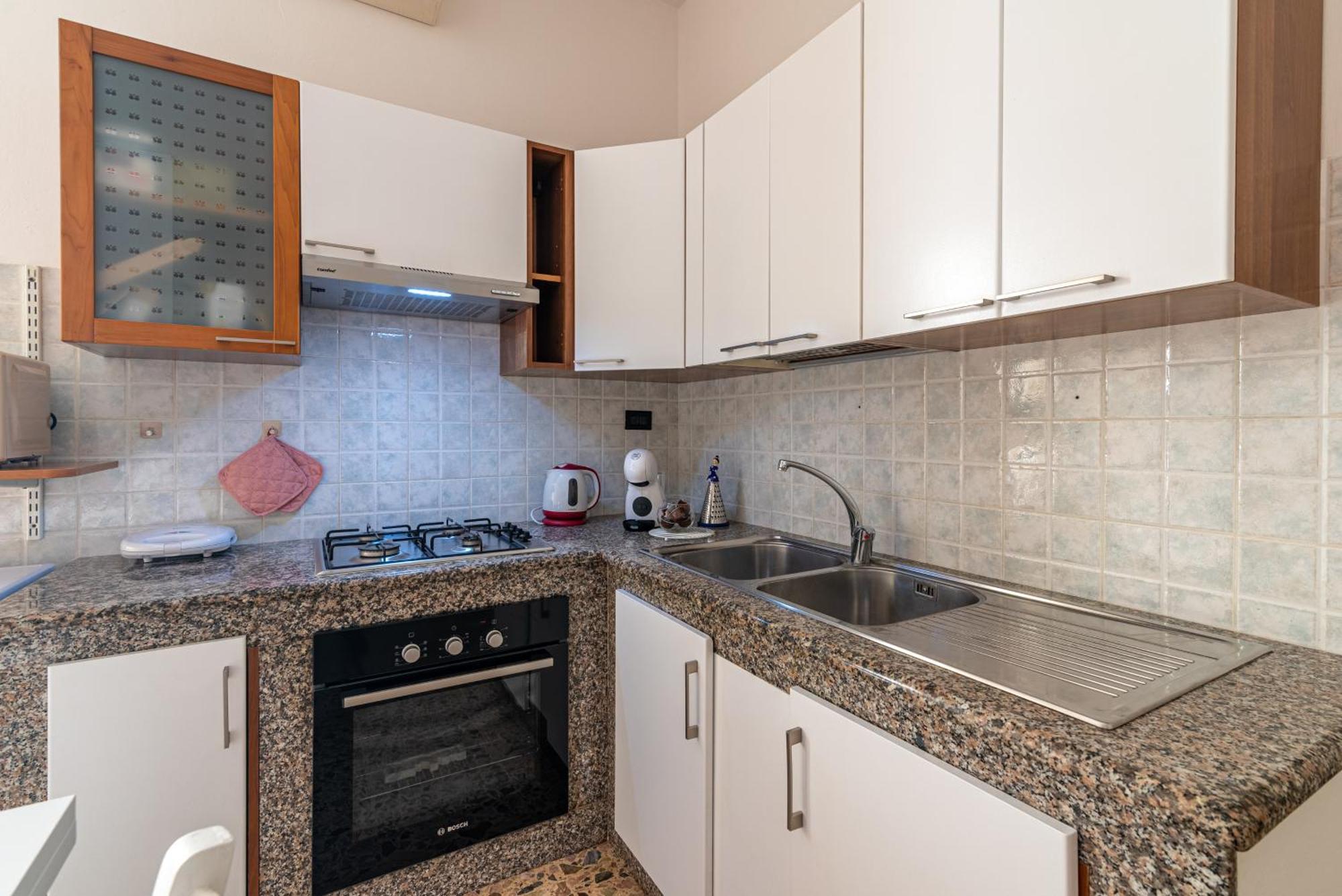 Venerdi House Apartment Алгеро Екстериор снимка